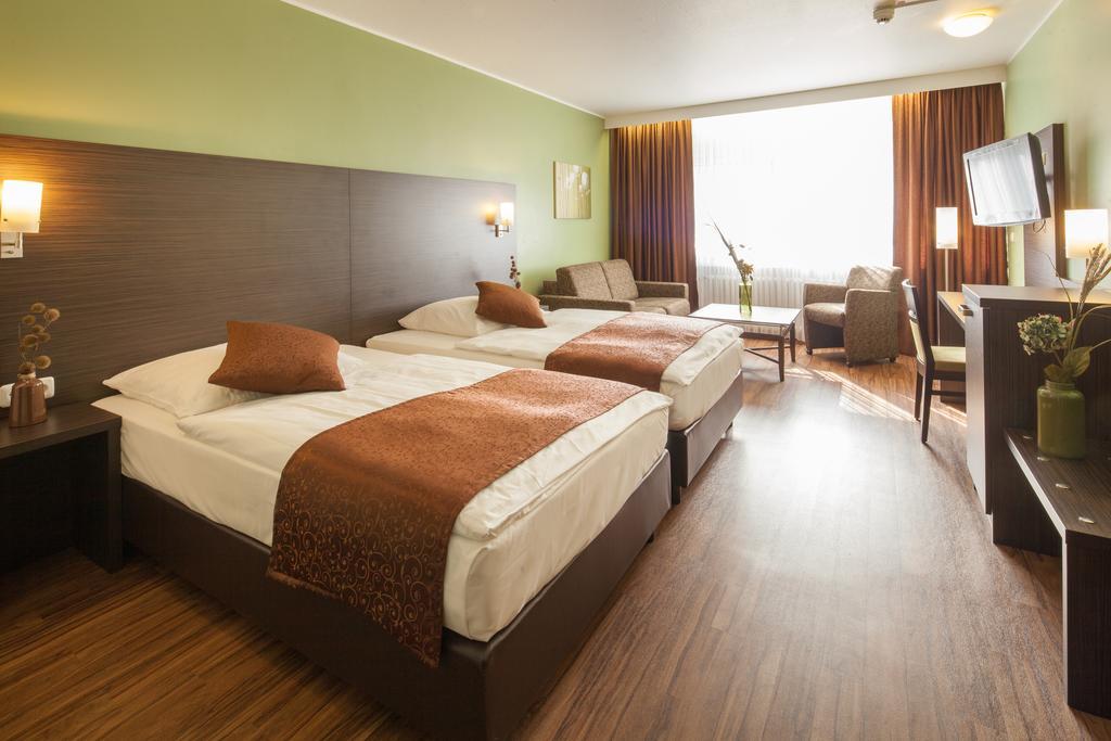 Hotel Mondial ลังเงนเฟลด์ ห้อง รูปภาพ